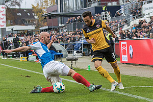 Fabian Müller setzt sich gegen Kiels Patrick Herrmann durch. (Foto: Steffen Kuttner)